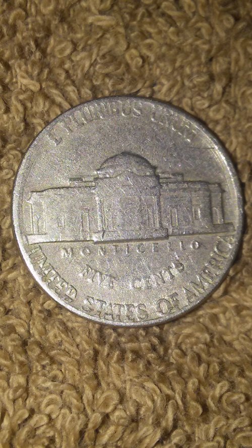 1971-D-Nickel-Has-A-Ring-Cut-Around-It-On-The-Reverse-Side